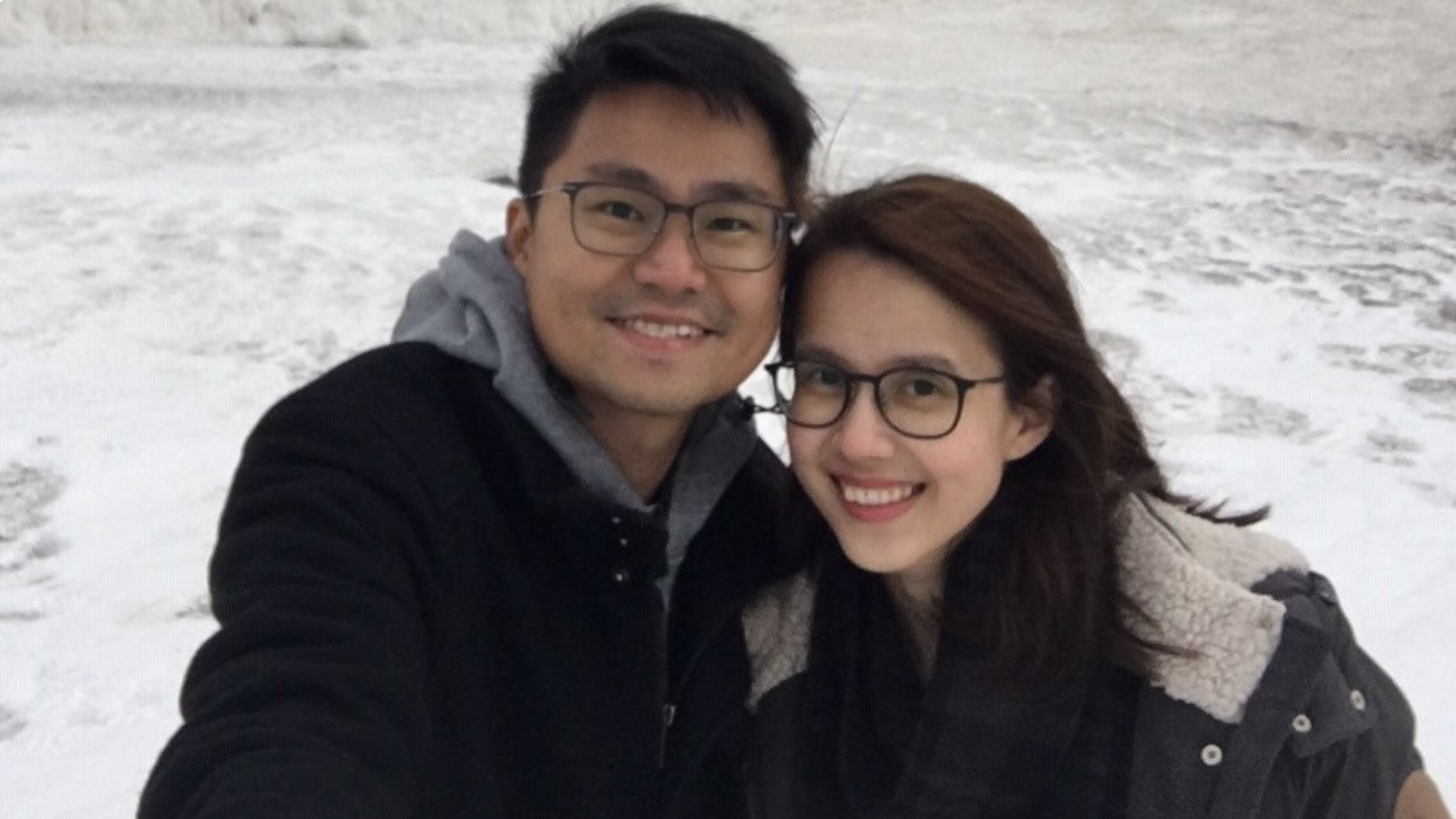 Edwin Teo and his partner taking a selfie in a snowy field
